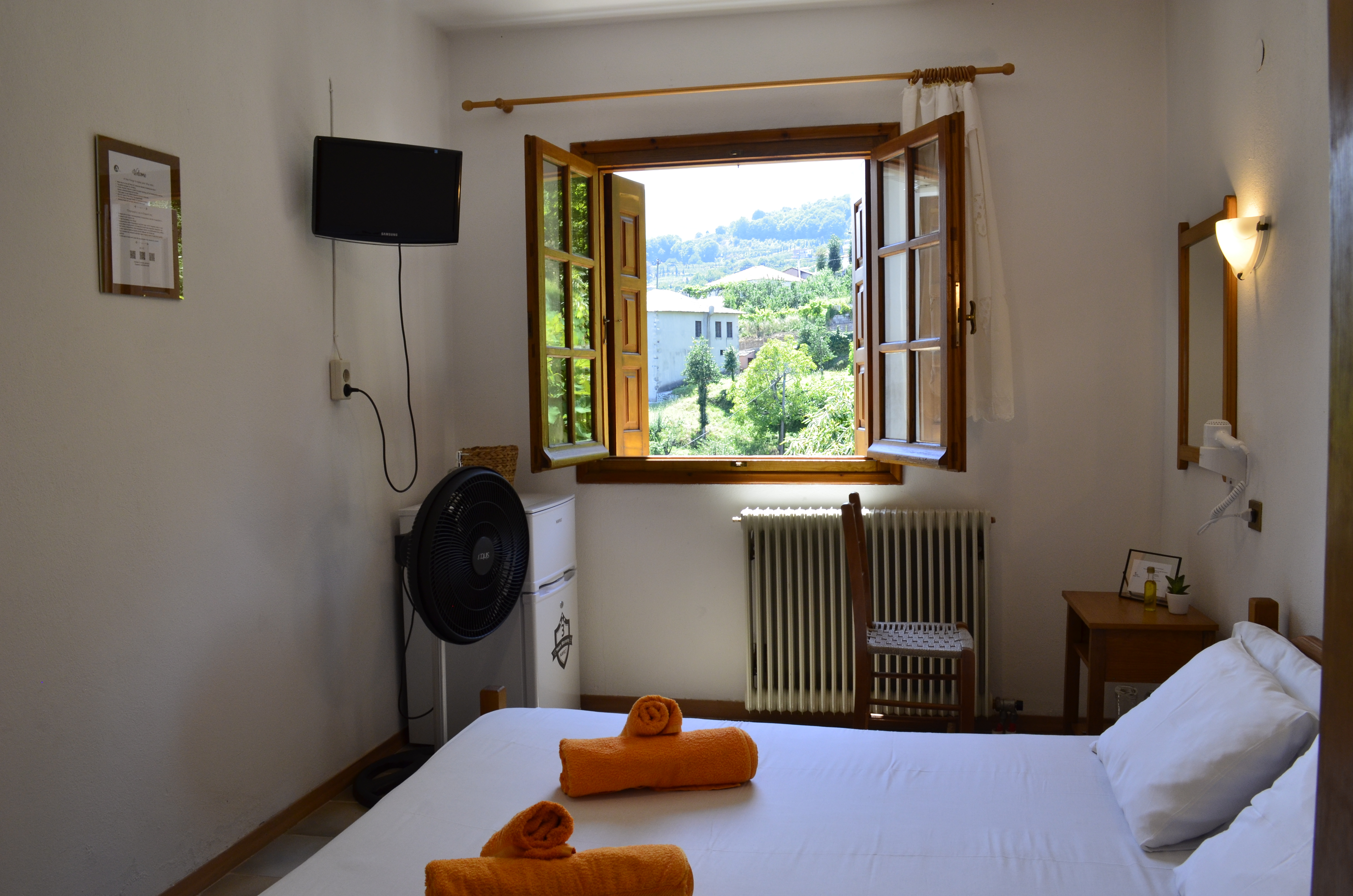 Antonis Tasios Chillout room is a double one with a view on Pelion mount and Zagora village. It is next to a stream and its breeze will cool you off on the summernights. Comes along with a bed, fridge, flat tv, bedside table - boudoir, hairdryer.